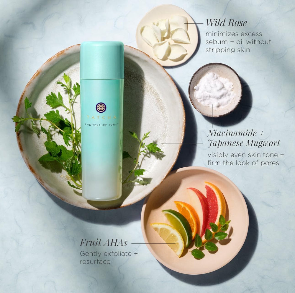TATCHA bottle beside common items to show size and portability for travel-friendly use