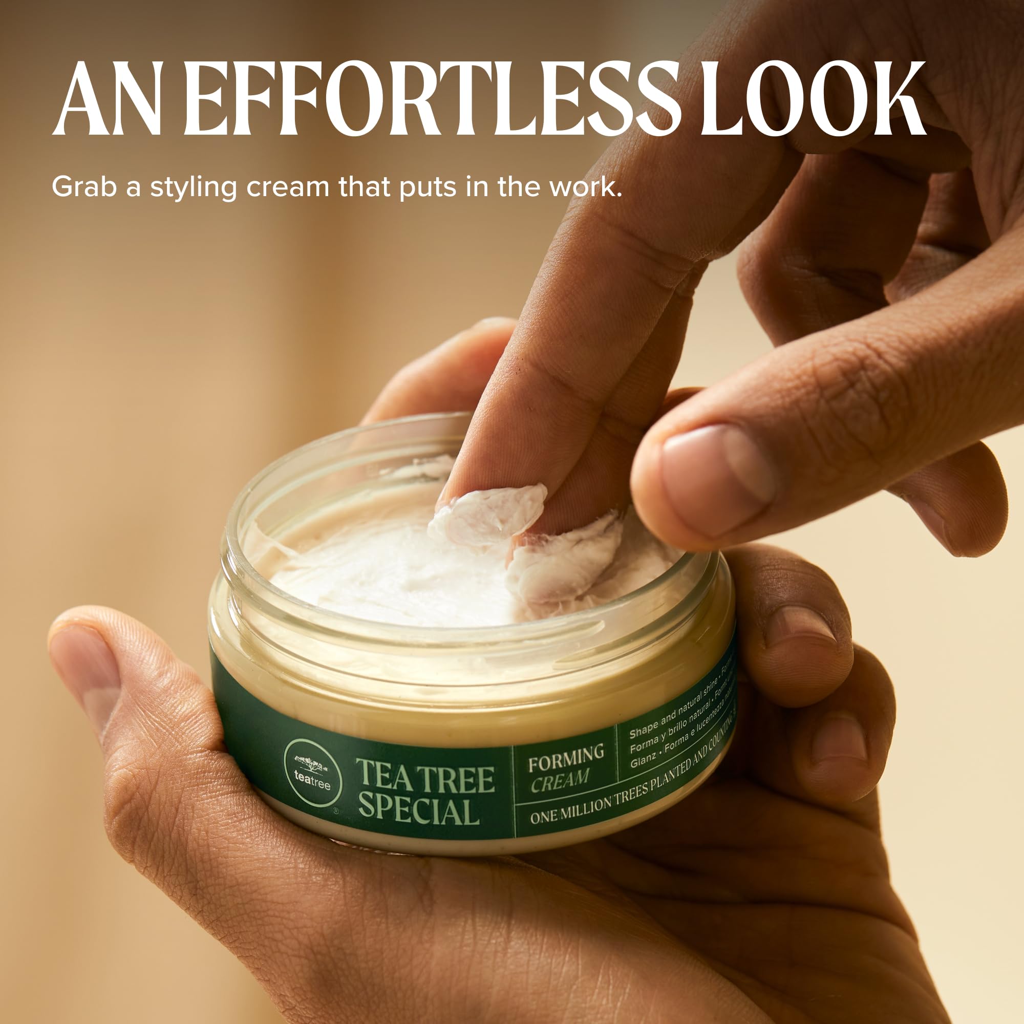 Cream on fingertips being applied, showing Tea Tree product easy distribution benefit