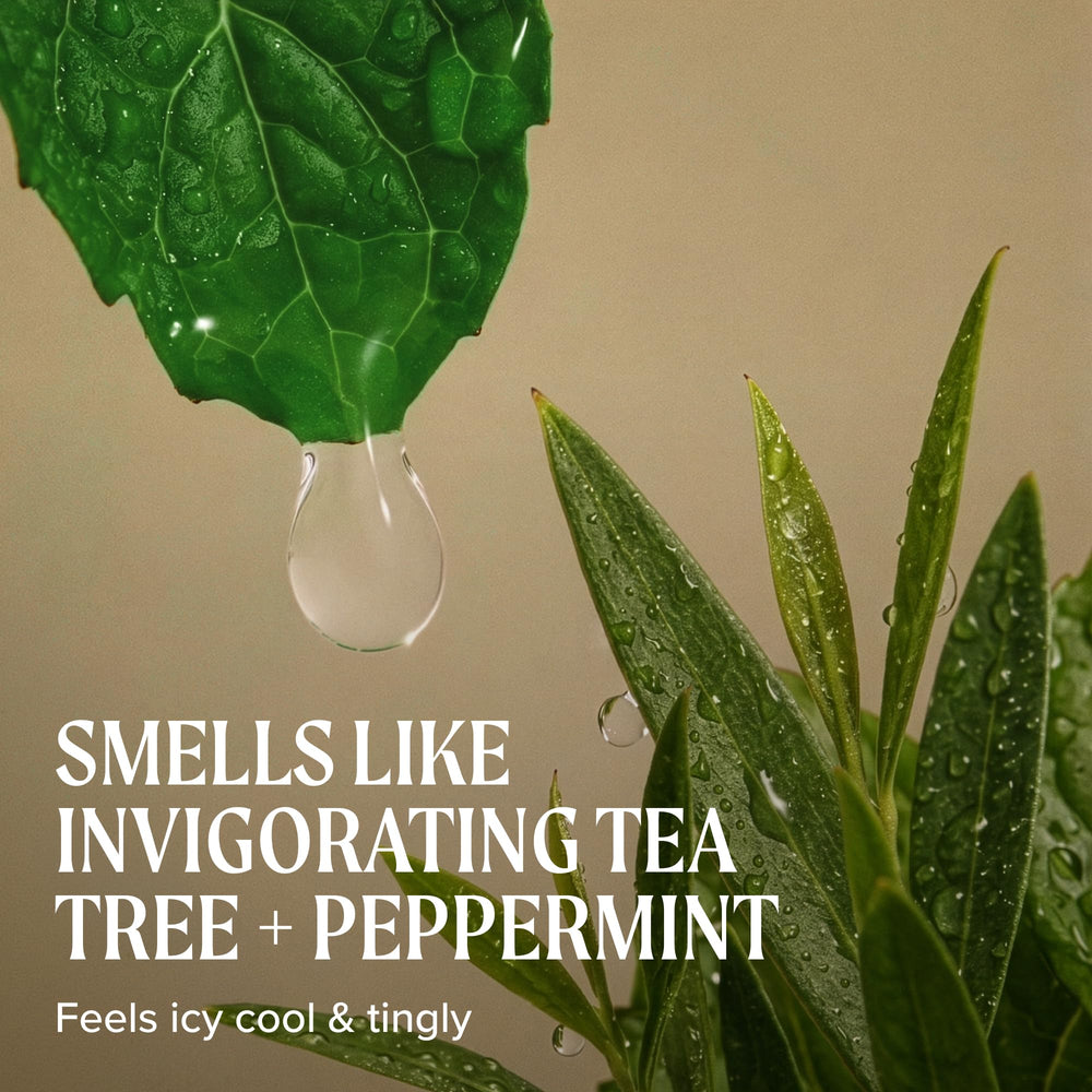 Applying Tea Tree shampoo to wet hair showing refreshing scalp benefit