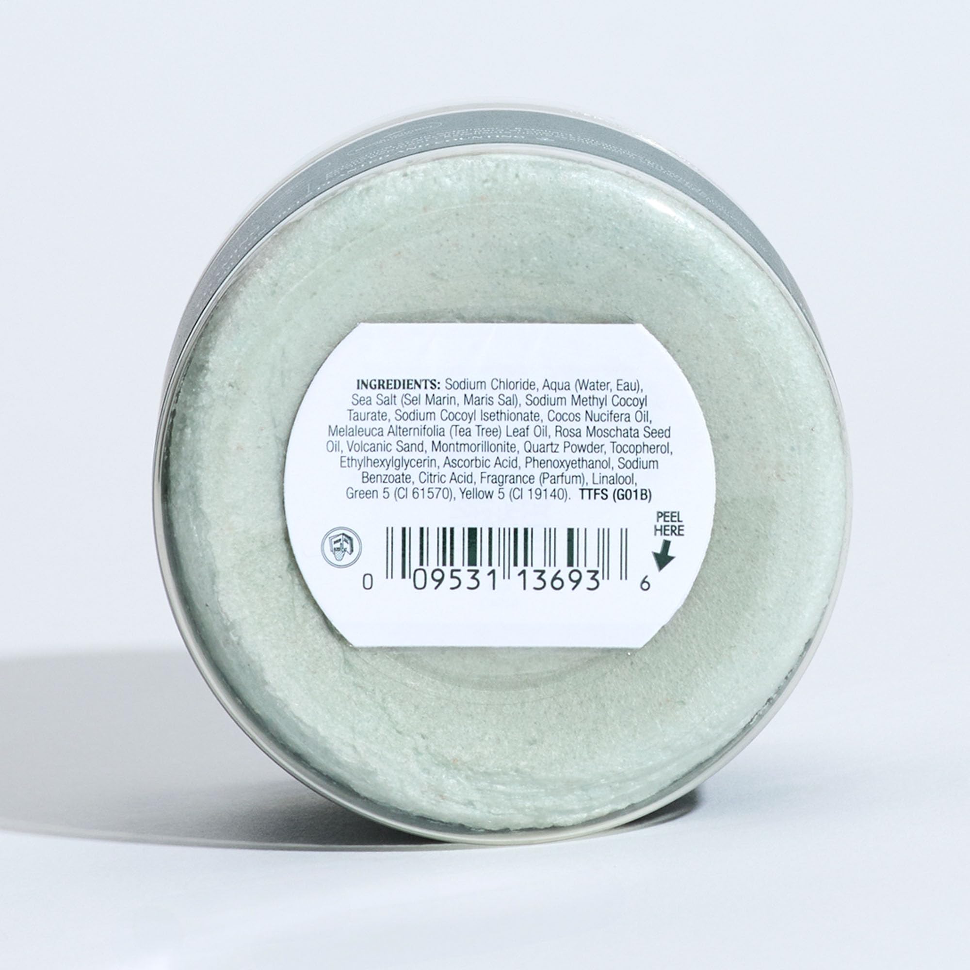 Tea Tree ingredients display of clay salt and volcanic ash, emphasizes purifying blend