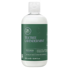 Tea Tree products beside ornament showing scale and festive gift-ready presentation