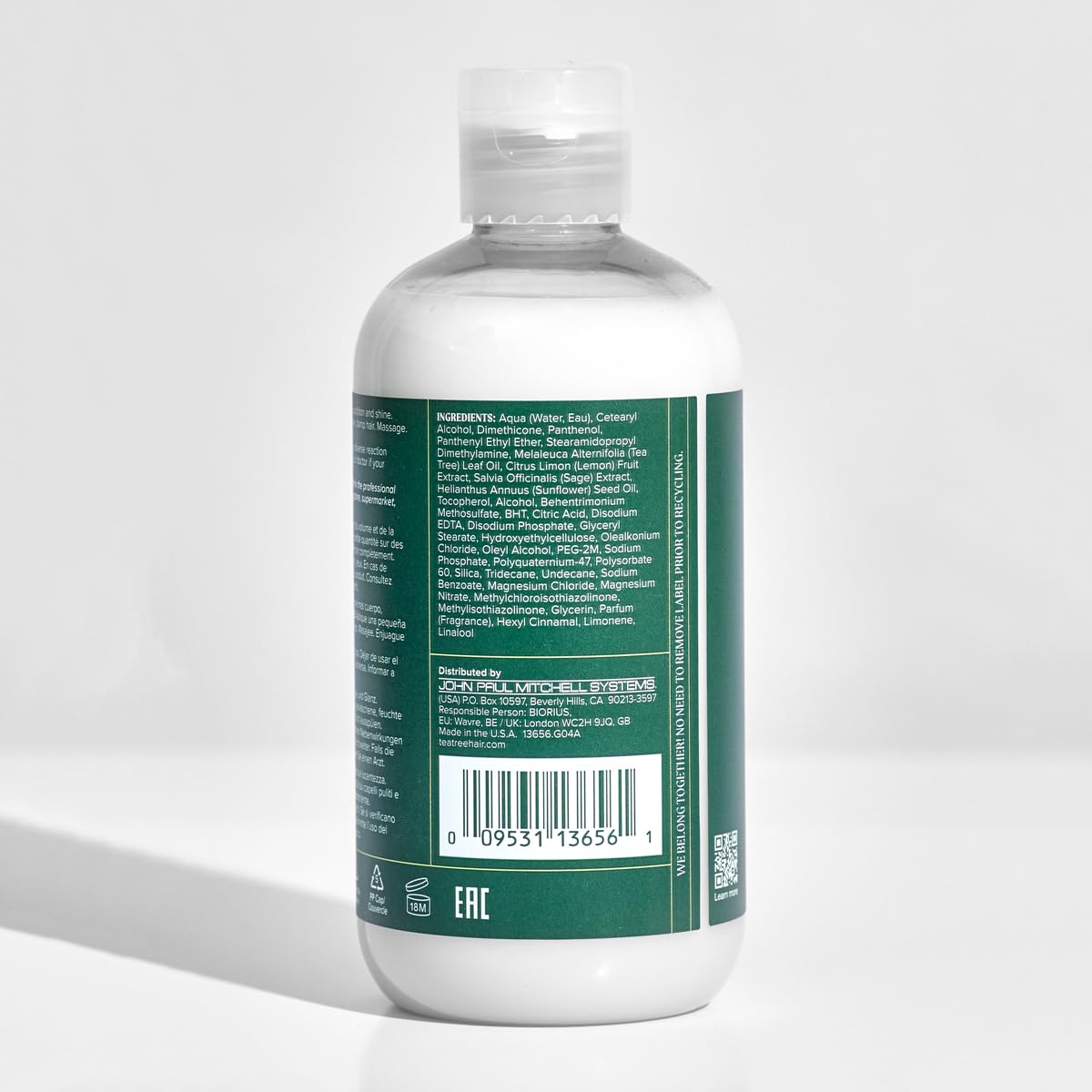 Tea Tree conditioner placed on bathroom shelf in lifestyle setting for fresh scent