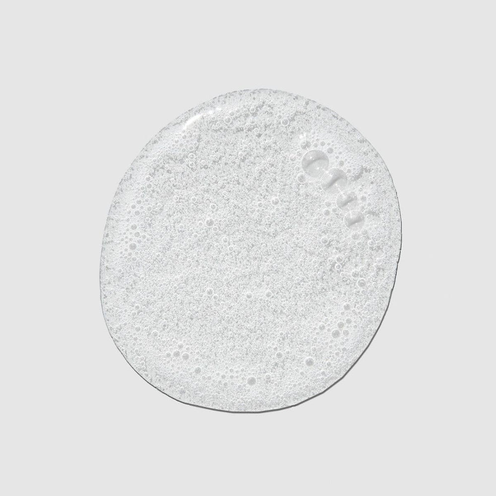Tea Tree in shower lifestyle with energized hair and fresh scent