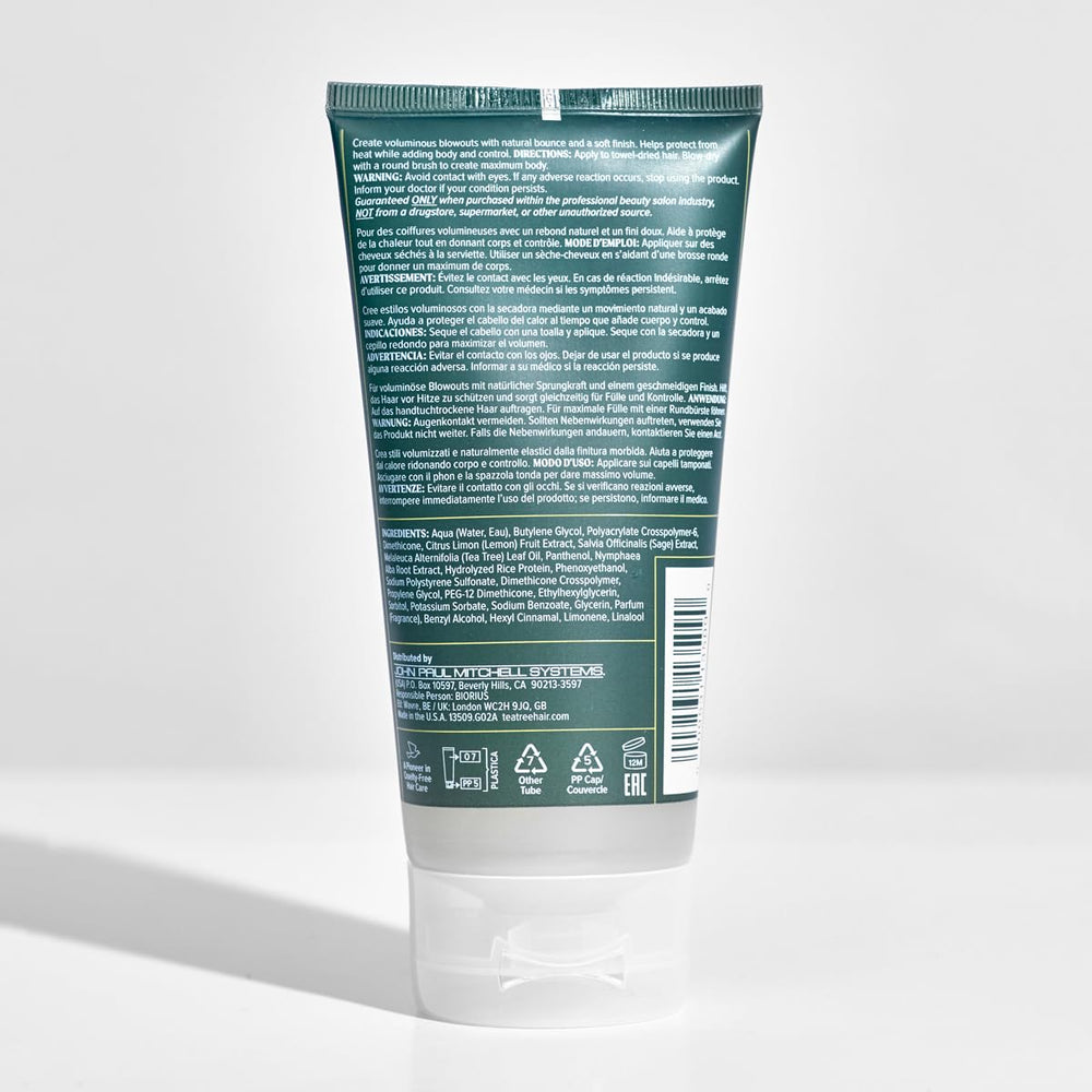 Tea Tree bottle held in hand for size comparison and travel-friendly benefit