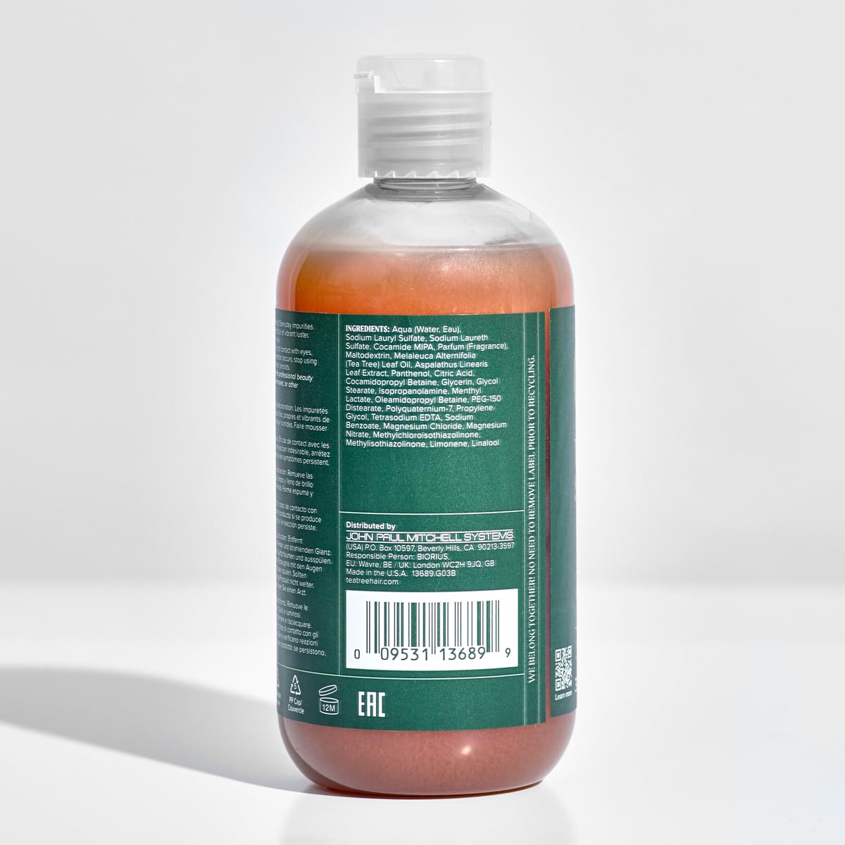 Tea Tree bottle on bathroom counter in lifestyle scene showing fresh scent benefit