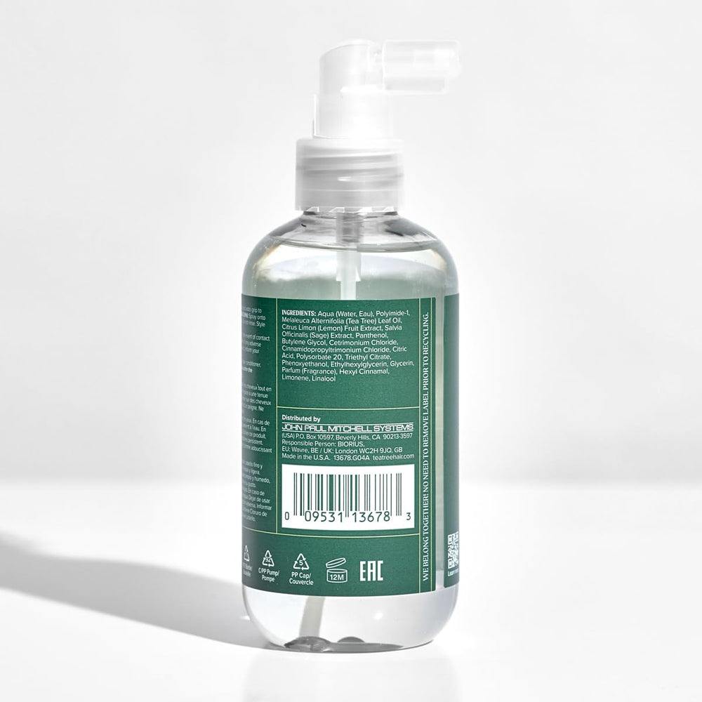 Tea Tree bottle on bathroom vanity next to towel demonstrating everyday styling convenience