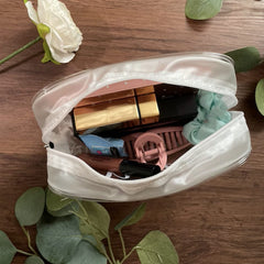 Tergy pouch size comparison with hand illustrating compact, portable capacity