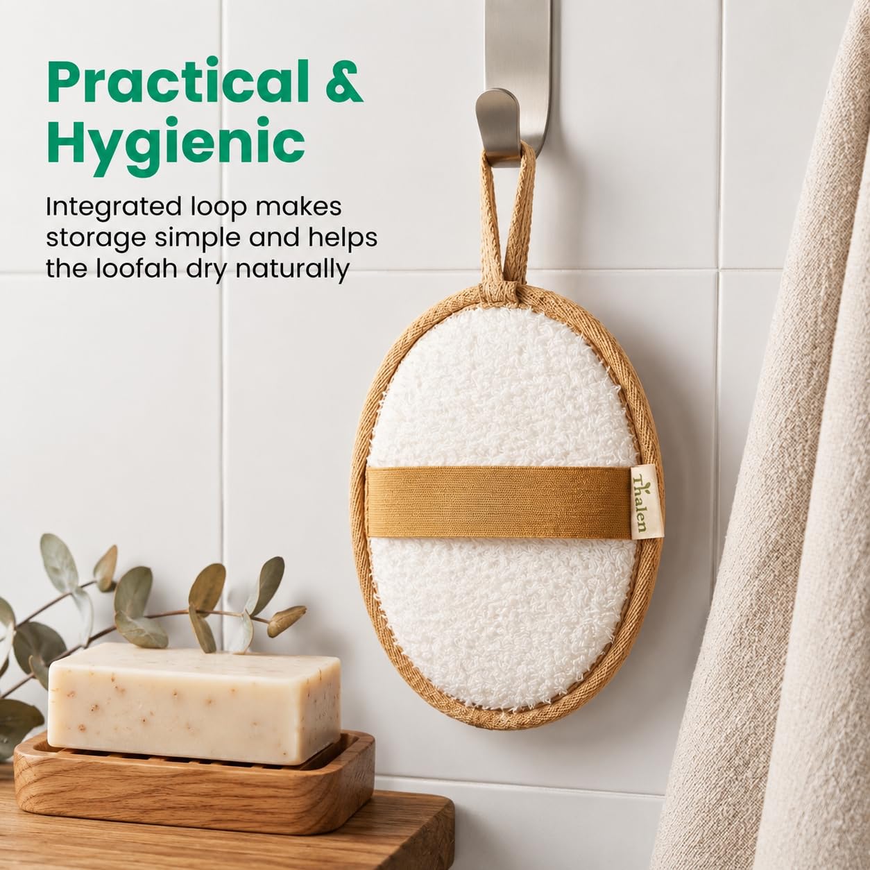 Thalen loofah in hand during shower demonstrating secure grip benefit