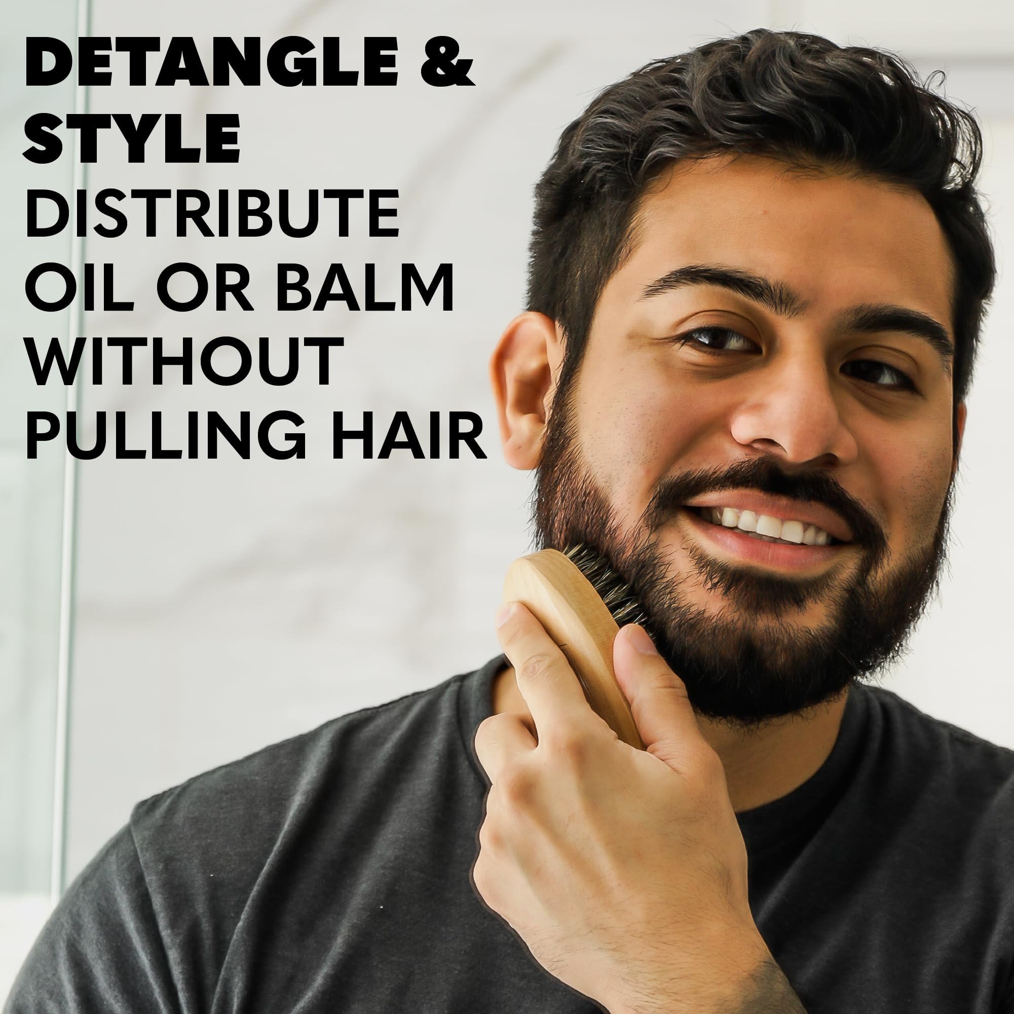The Beard Club boar bristle brush close-up evenly distributes product