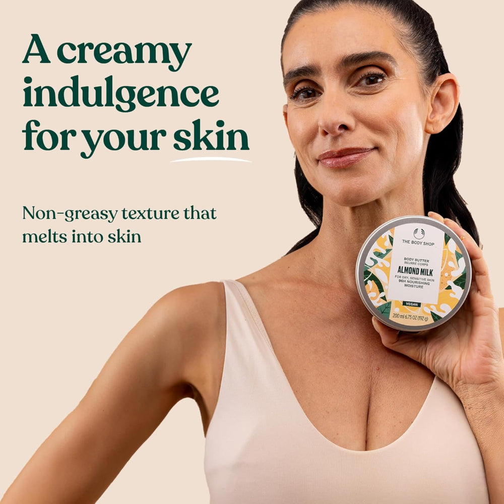 The Body Shop almond milk smoothed over elbow illustrating targeted moisture for dry patches