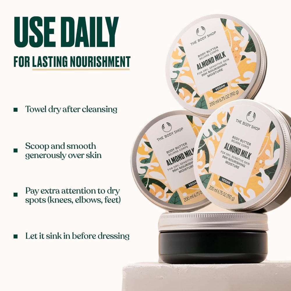 The Body Shop almond milk on bathroom shelf styled in a routine setting suggesting daily care
