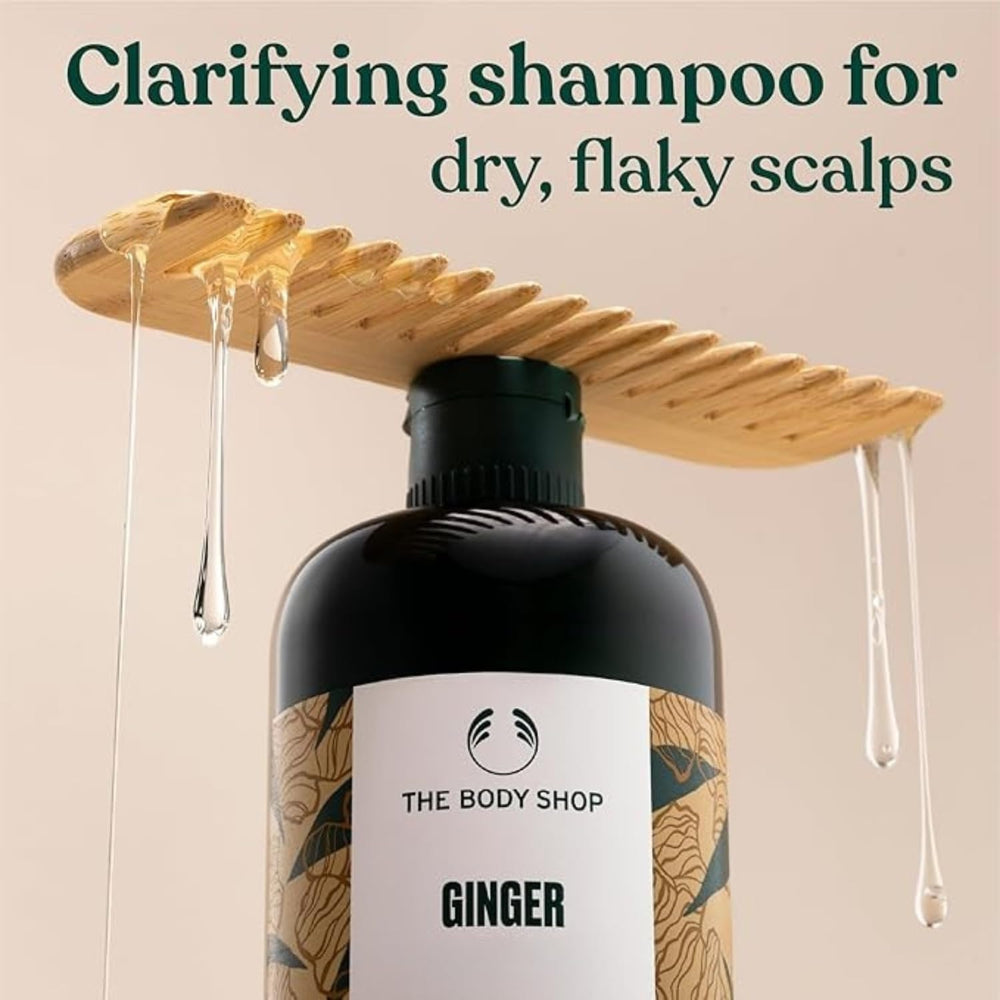 The Body Shop ginger shampoo lather closeup demonstrating gentle foaming benefit