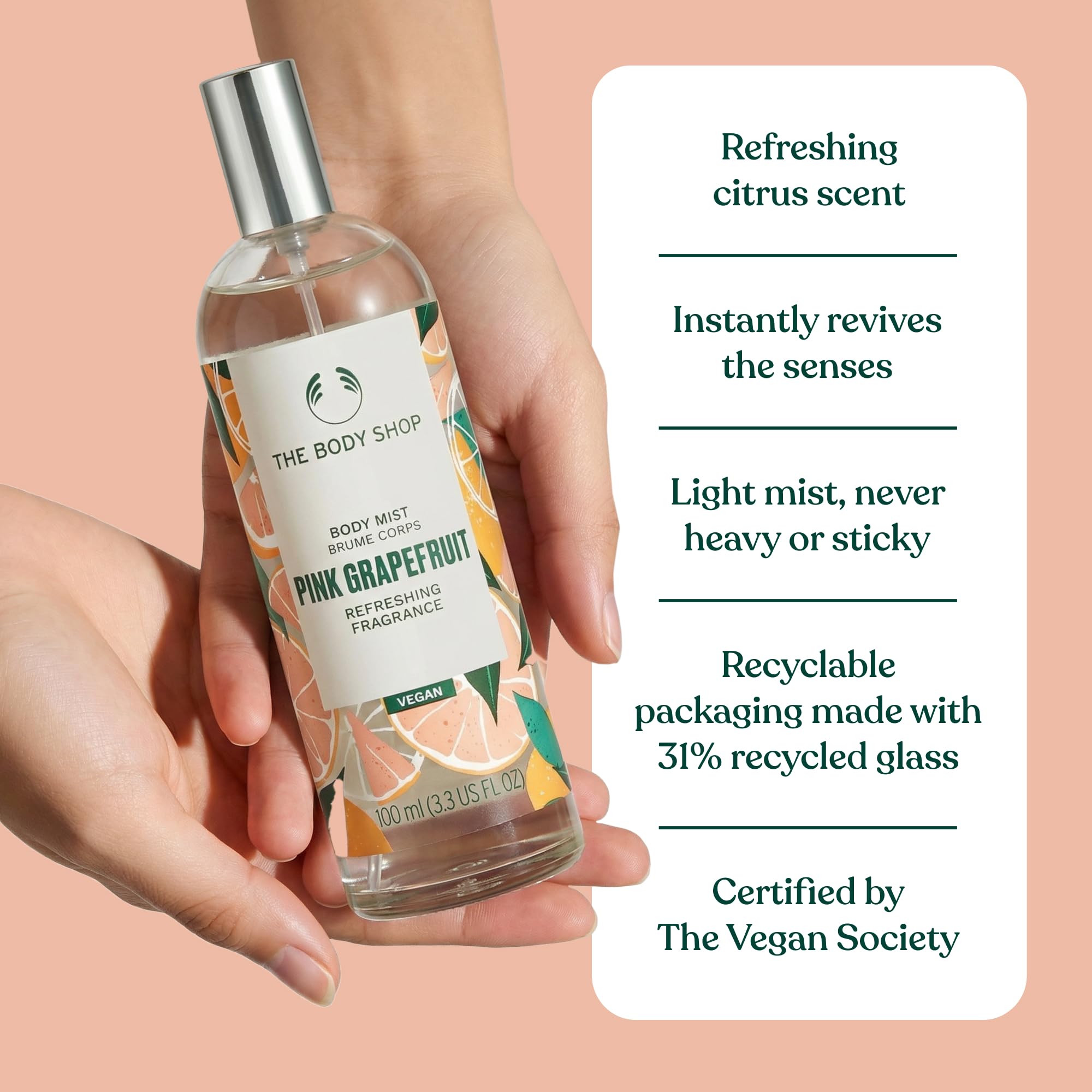 3.3 oz The Body Shop bottle held in hand showing travel-friendly size and convenience