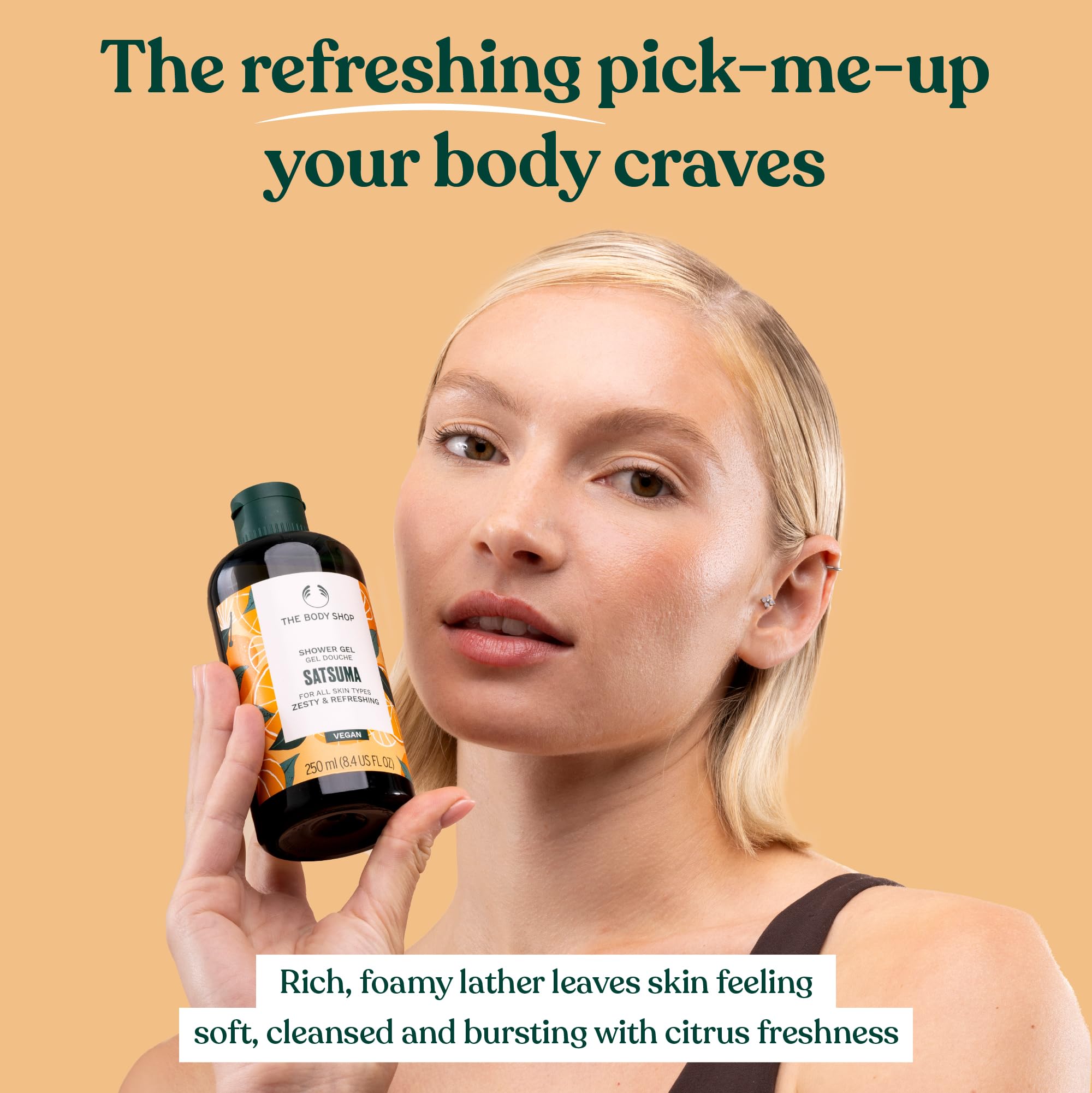 The Body Shop satsuma bottle staged on bathroom shelf showing aesthetic storage benefit