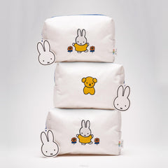 The Crème Shop Miffy open filled pouch showing organized essentials