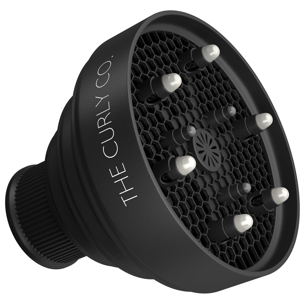 The Curly Co. diffuser collapsed flat for easy travel and compact storage benefit