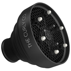 The Curly Co. diffuser collapsed flat for easy travel and compact storage benefit
