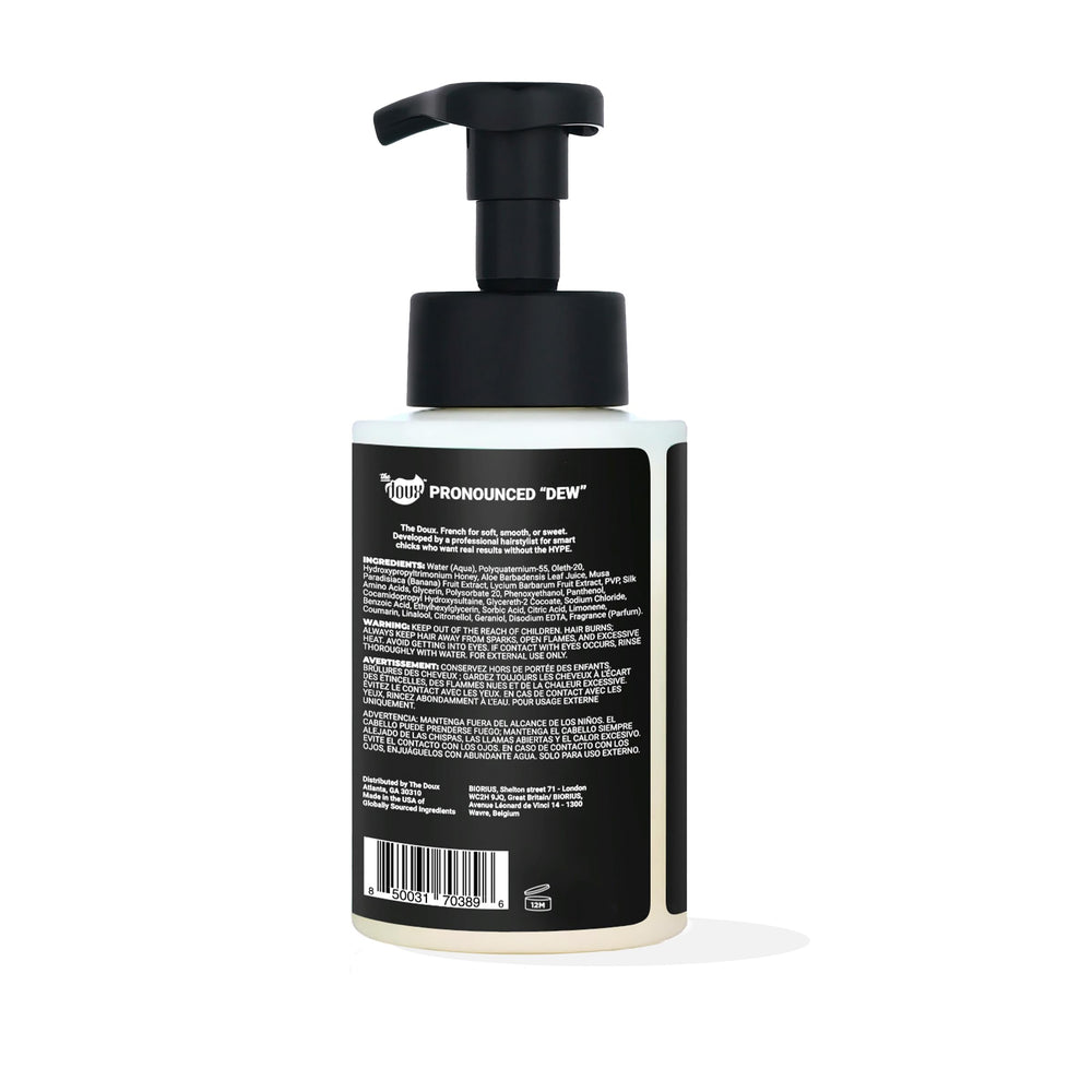The Doux gel-to-foam texture close-up demonstrating airy foam for even curl distribution