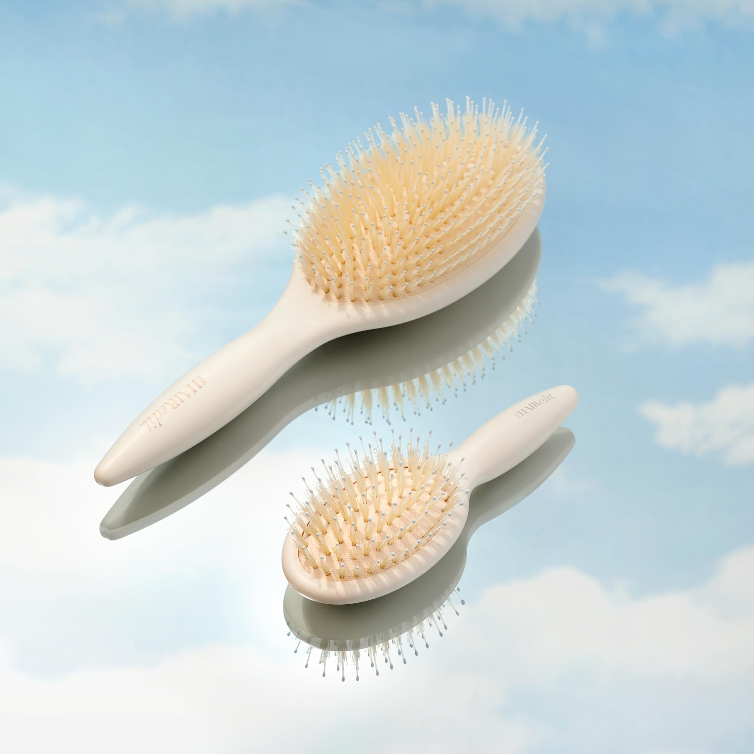 The Hair Edit brushing hair to show polished finish and reduced flyaways