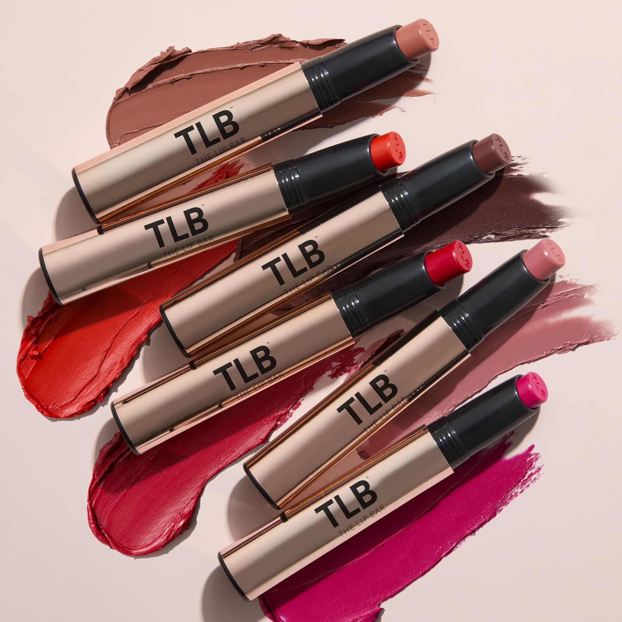 The Lip Bar in hand scale showing compact size and travel-friendly benefit