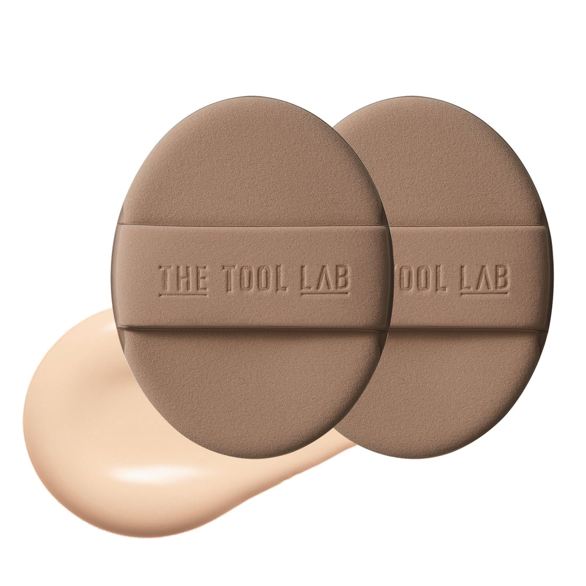 THE TOOL LAB oval puff front view showing smooth glow surface and even application benefit