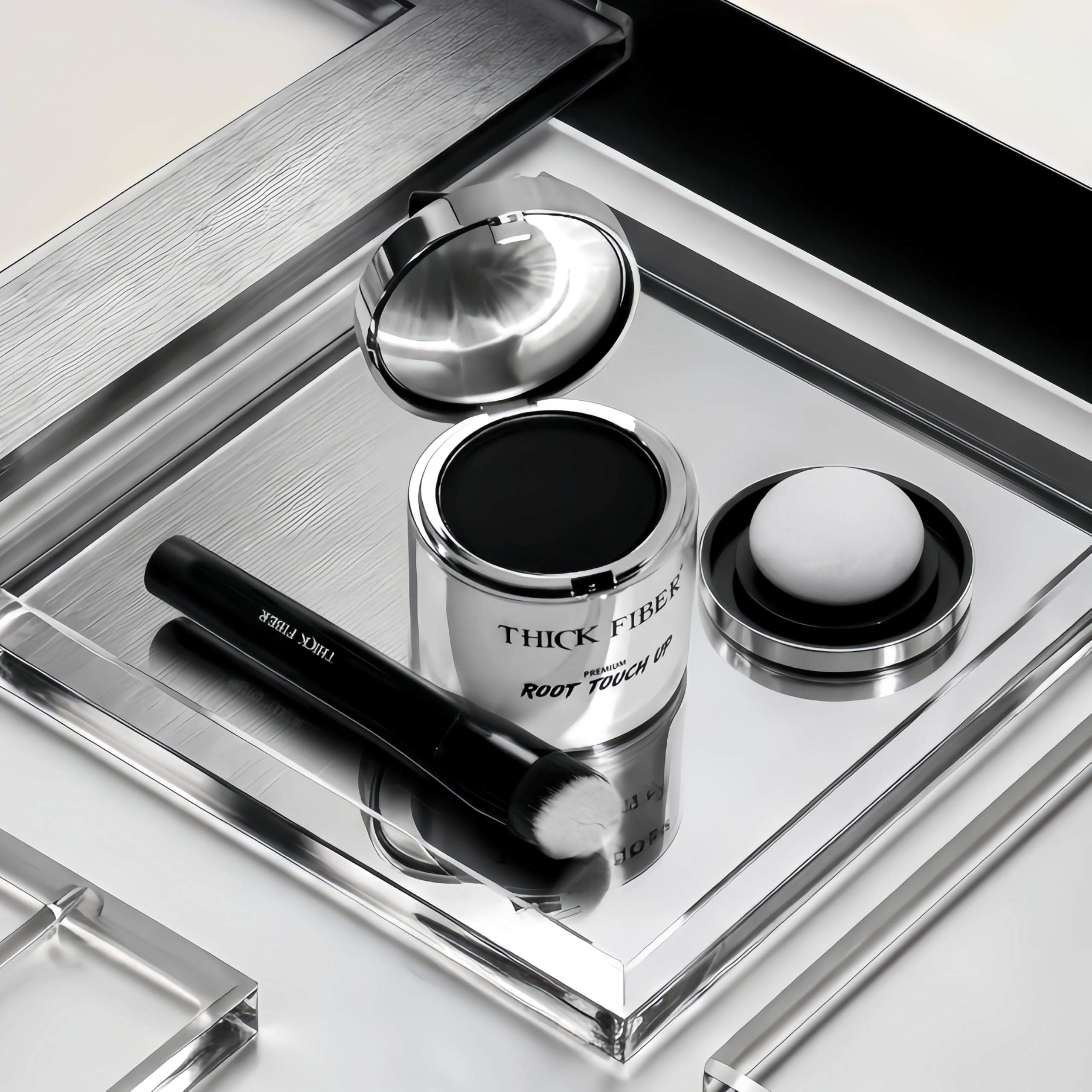 THICK FIBER compact kit next to hand showing travel-friendly size