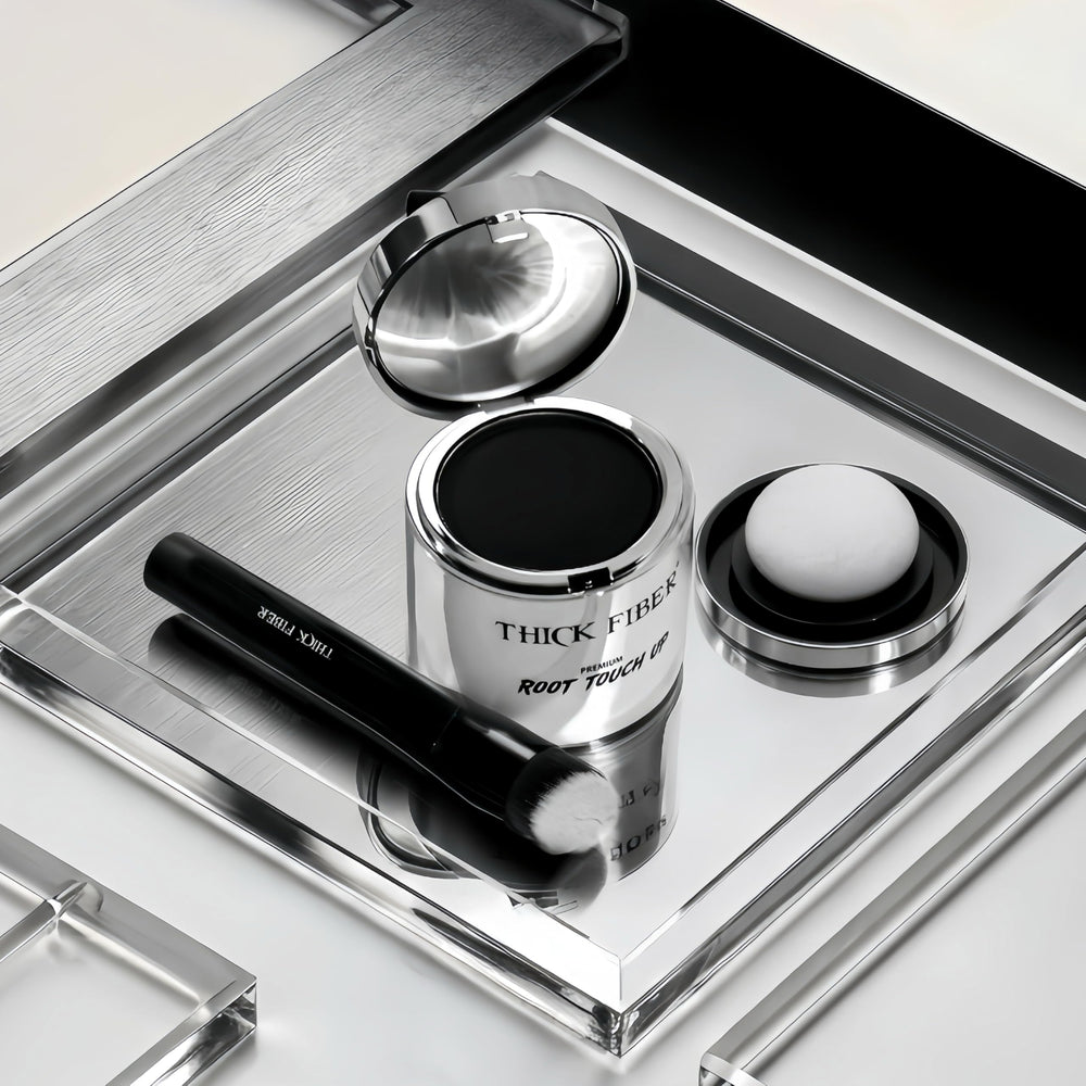 THICK FIBER compact kit next to hand showing travel-friendly size
