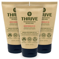 Thrive Natural Care front packaging showing SPF50 and reef-safe badge