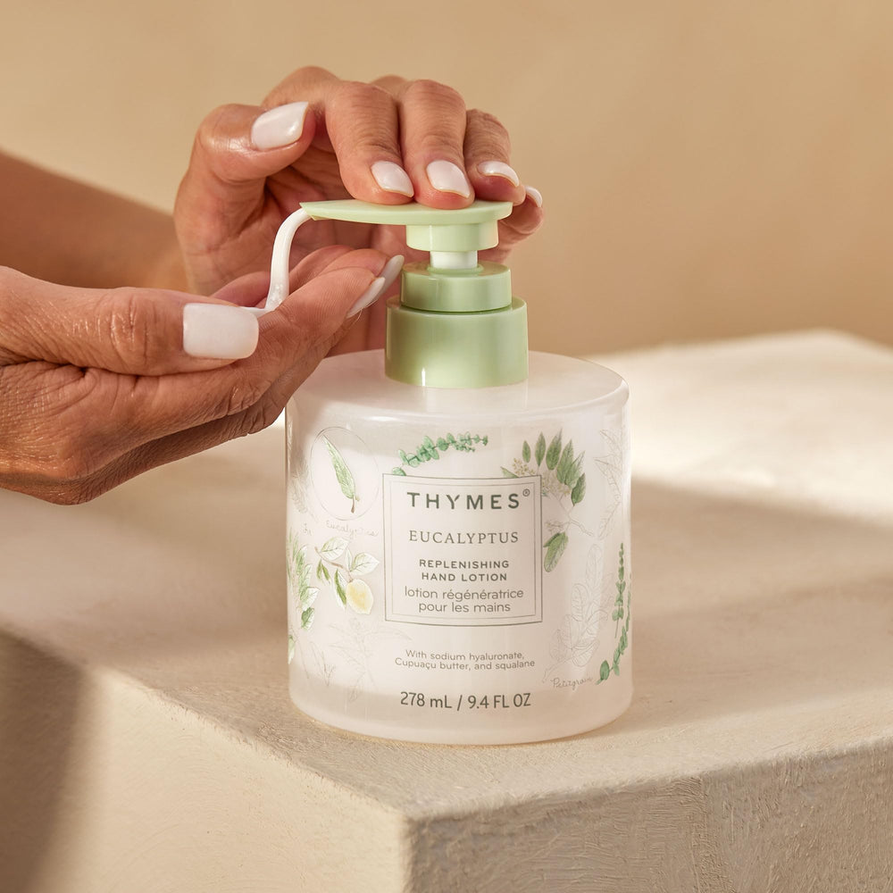 Thymes eucalyptus bottle next to hand wash illustrating coordinated sink-side routine benefit