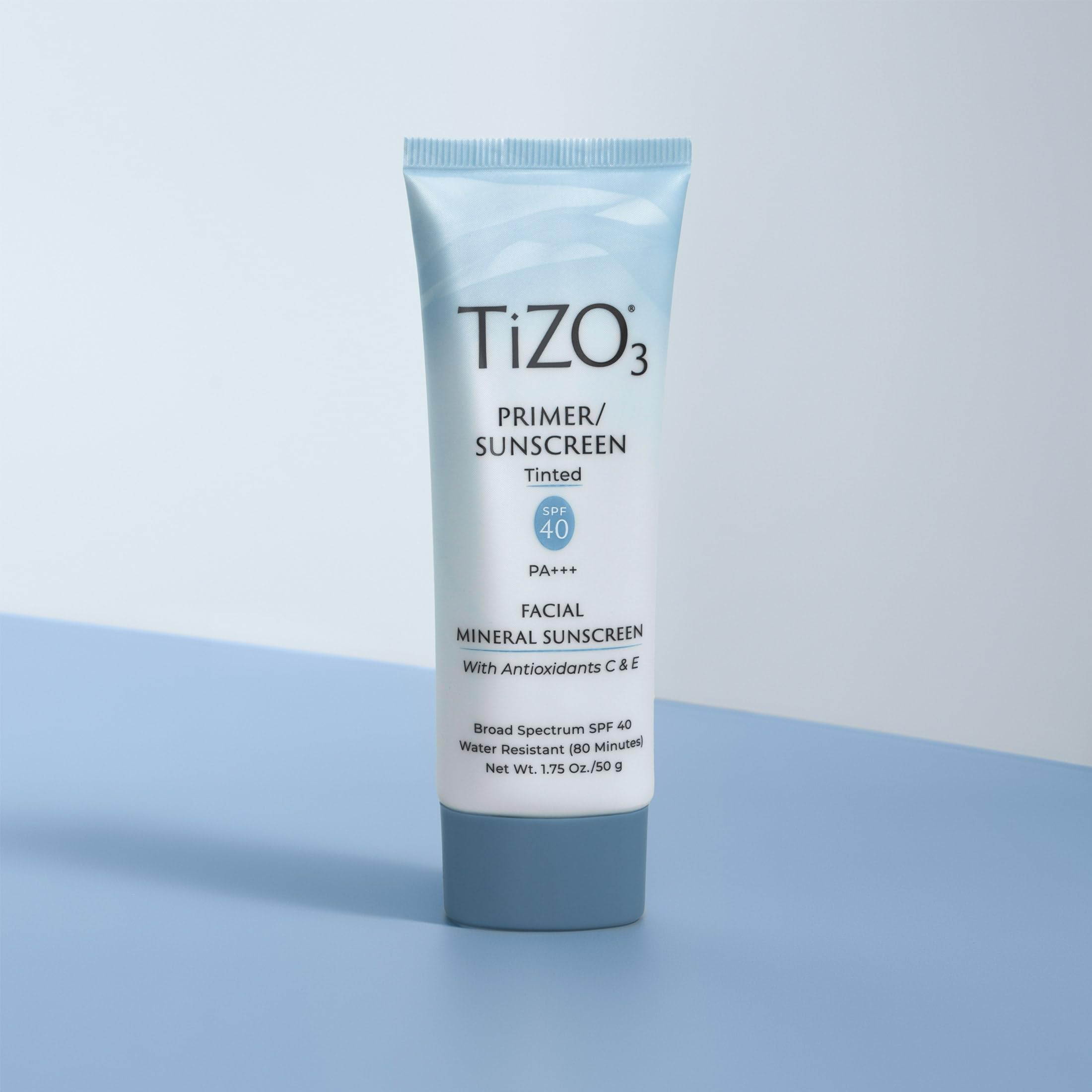 TIZO TiZO3 tube beside ruler showing 1.75 oz size