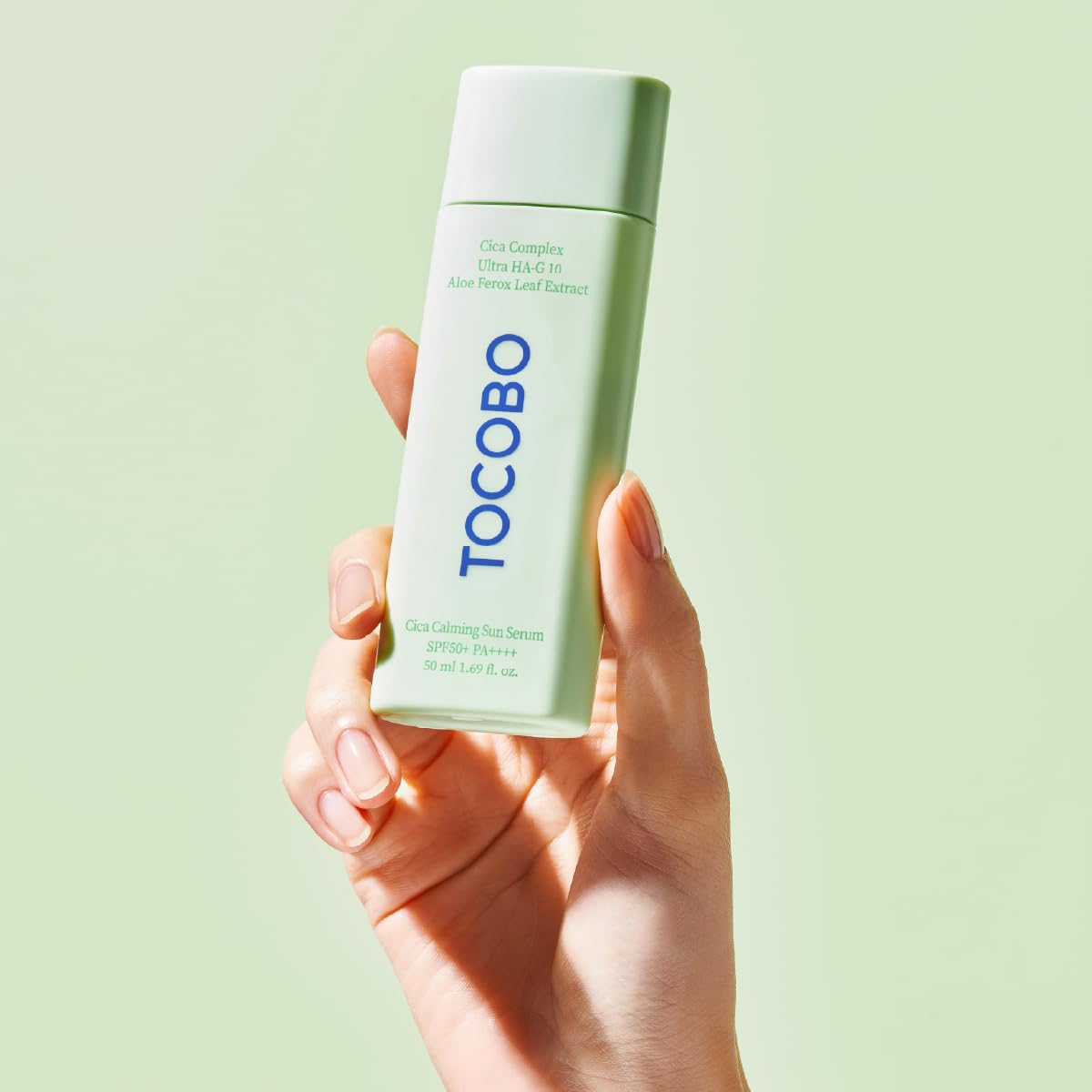 TOCOBO serum being absorbed into hand showing fast absorption benefit