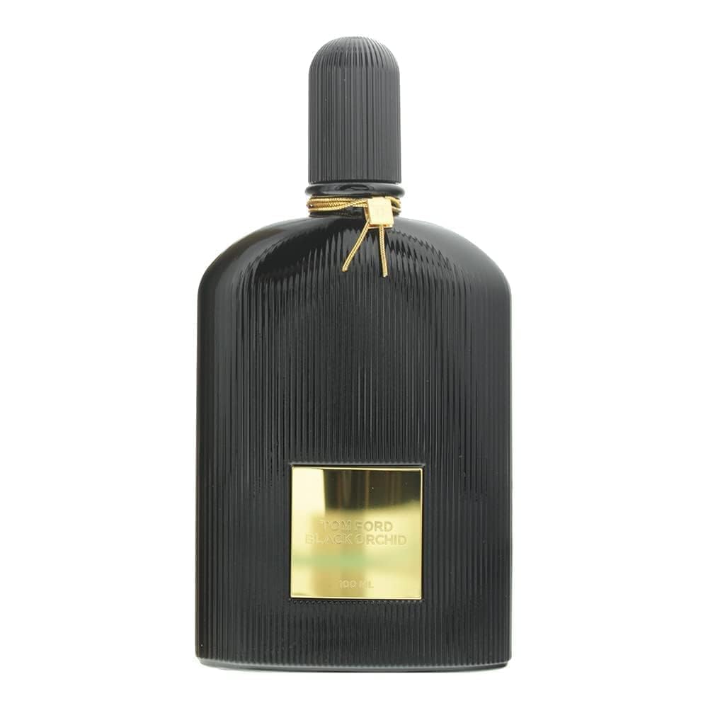 Tom Ford Black Orchid mist being sprayed demonstrating easy application and lasting scent