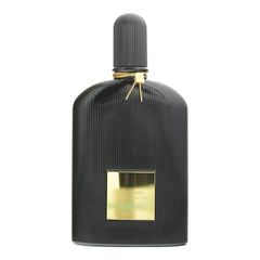 Tom Ford Black Orchid mist being sprayed demonstrating easy application and lasting scent