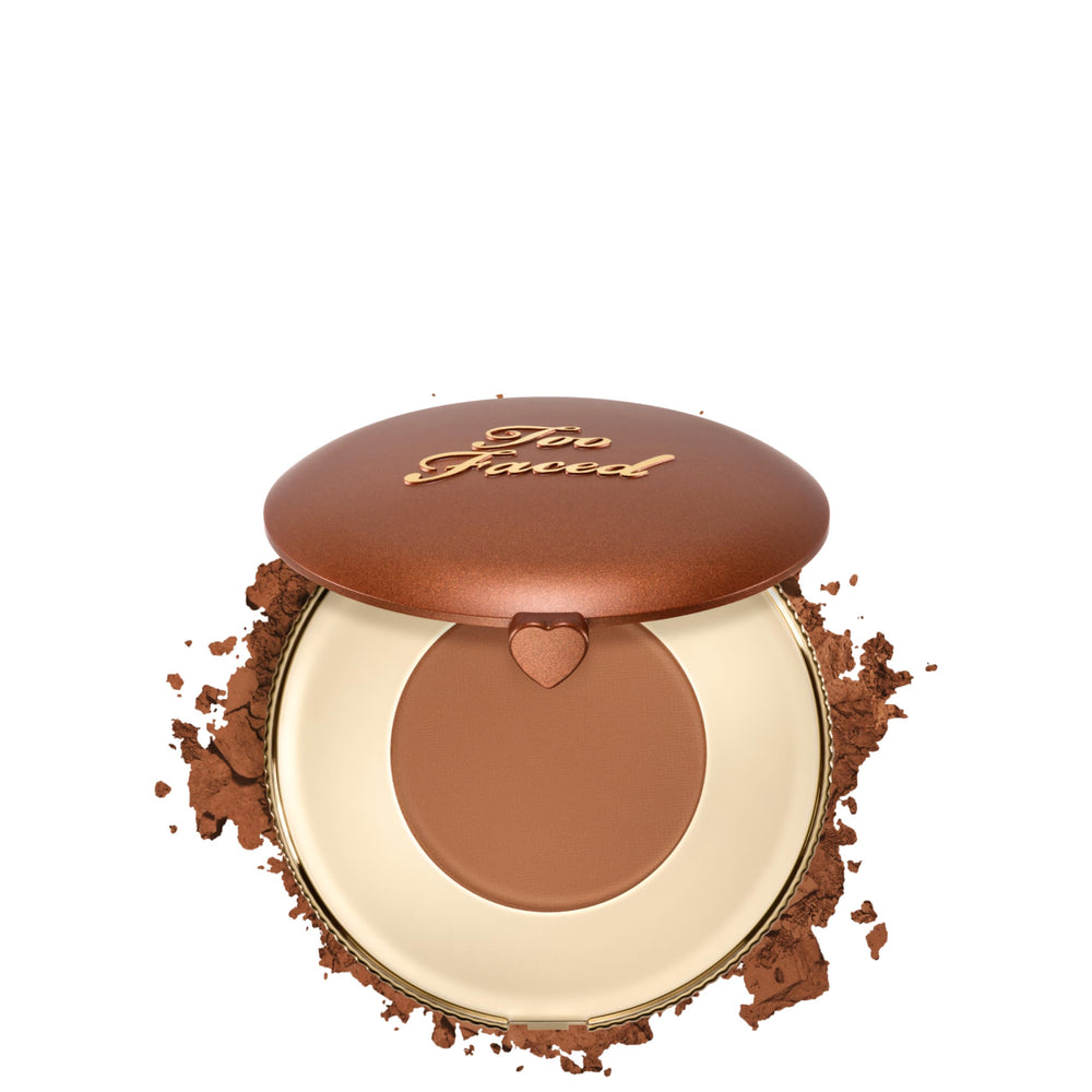 Too Faced compact front view showing bronzer and mirror for easy touch-ups