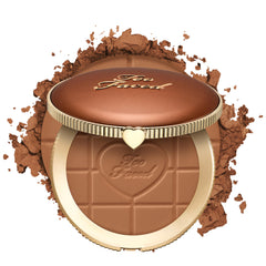Too Faced compact open showing bronzer pan and mirror for easy application