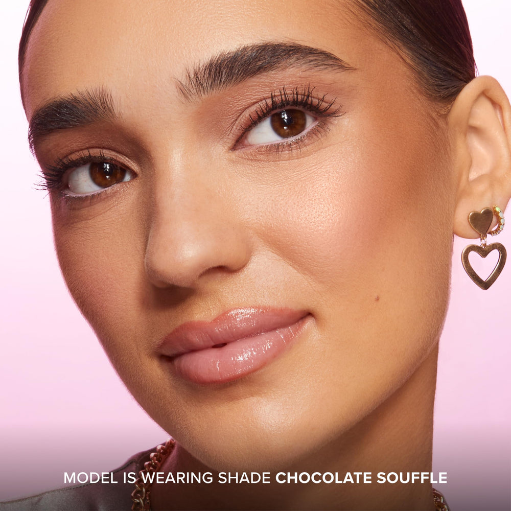 Too Faced Chocolate Soleil swatches on arm showing buildable shade range