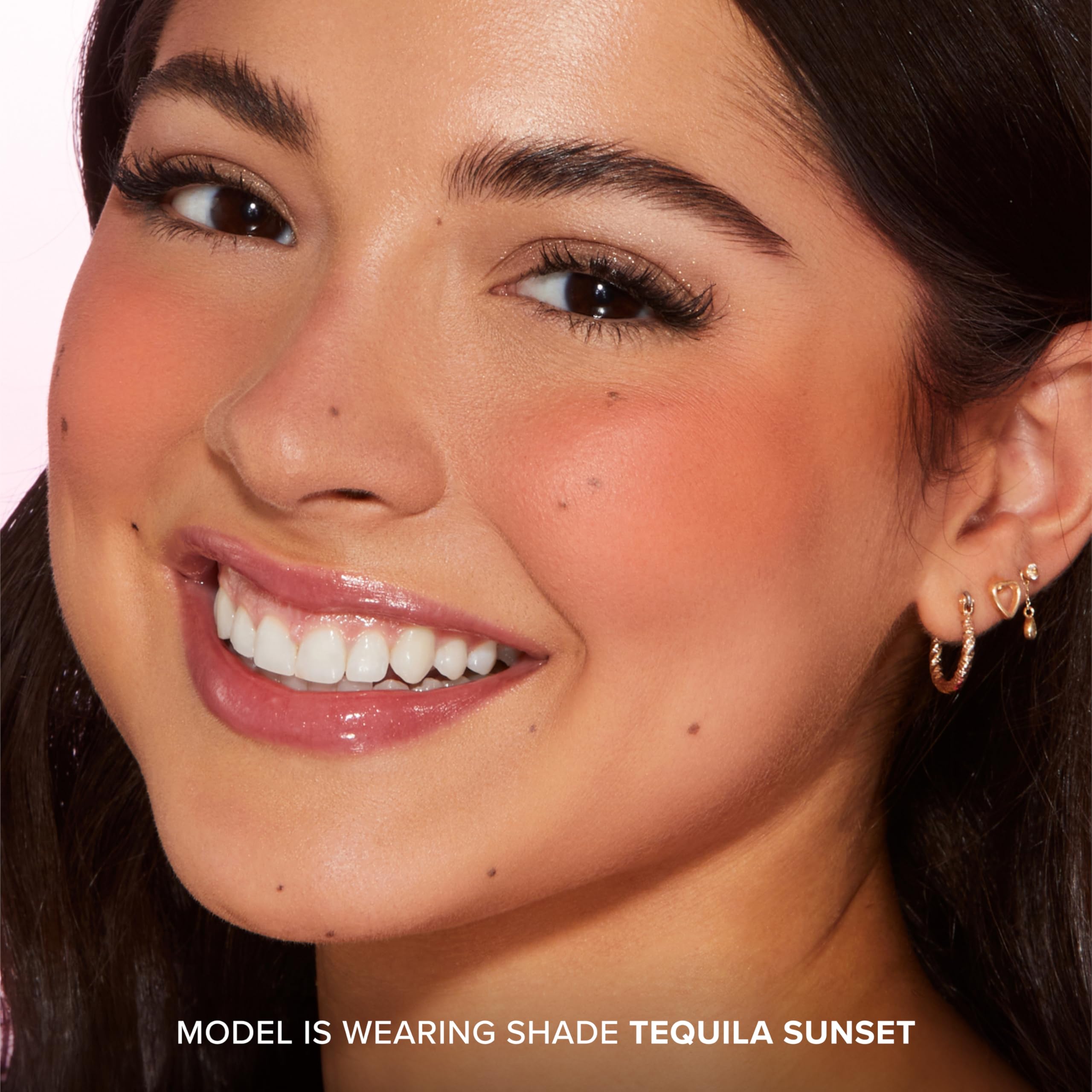 Too Faced brush applying blush illustrating easy blending and soft-focus effect
