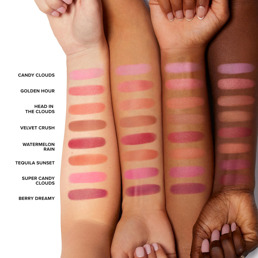 Too Faced lifestyle image applying blush on cheeks demonstrating natural finish benefit
