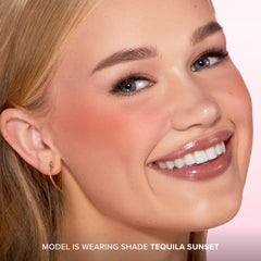 Too Faced swatch on cheek demonstrating natural flush and diffused finish