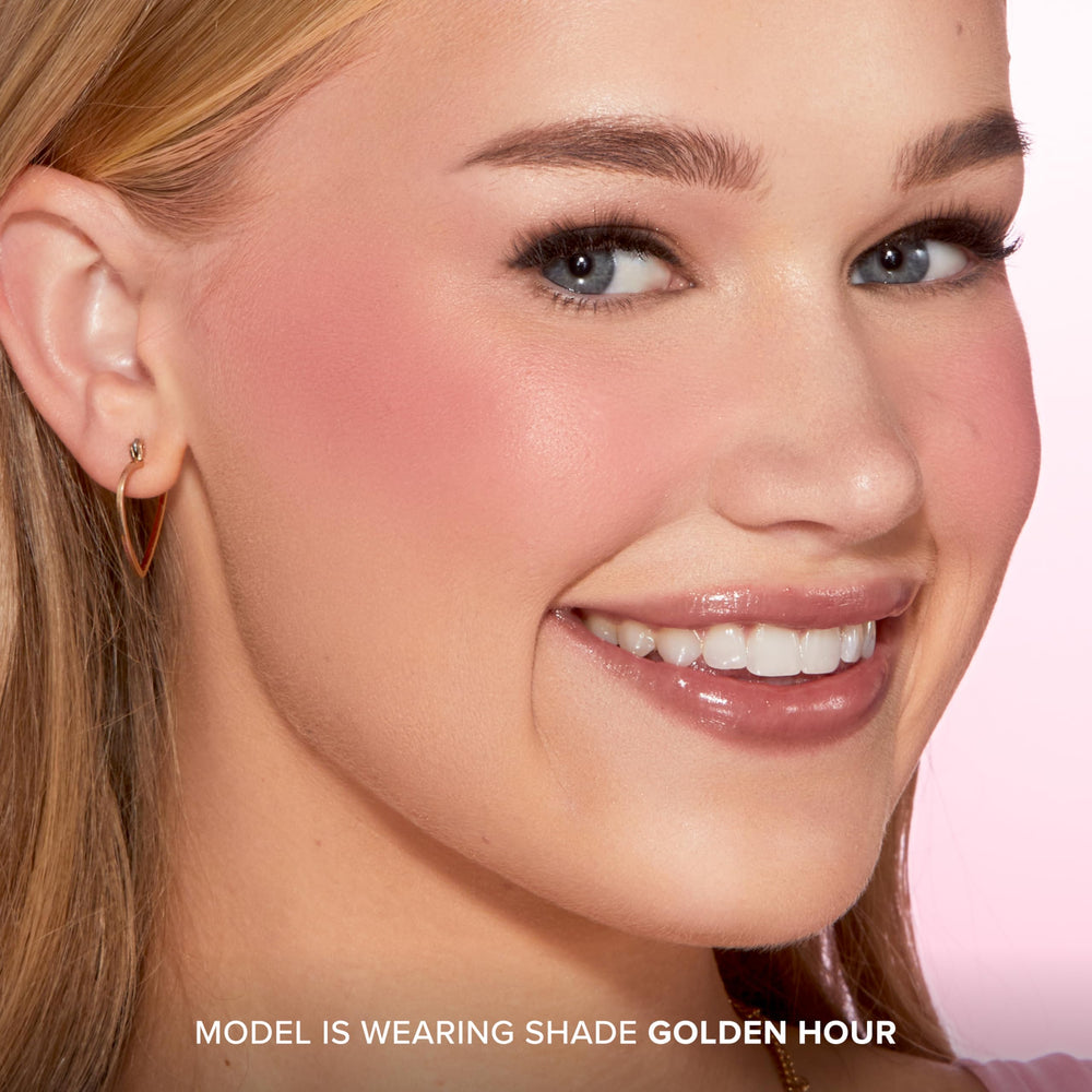 Too Faced swatch on skin showing Golden Hour color payoff and buildable glow benefit