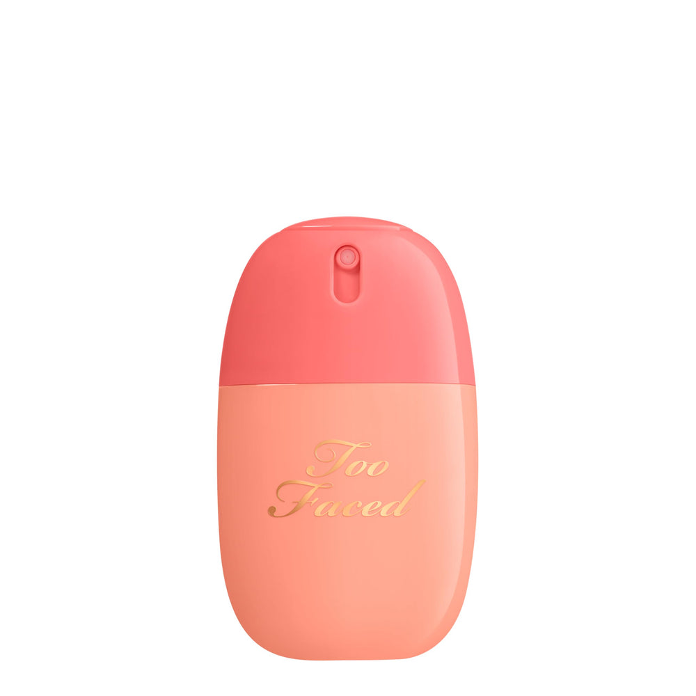 Too Faced Peach Mist front bottle showing compact travel-friendly size and finish benefit