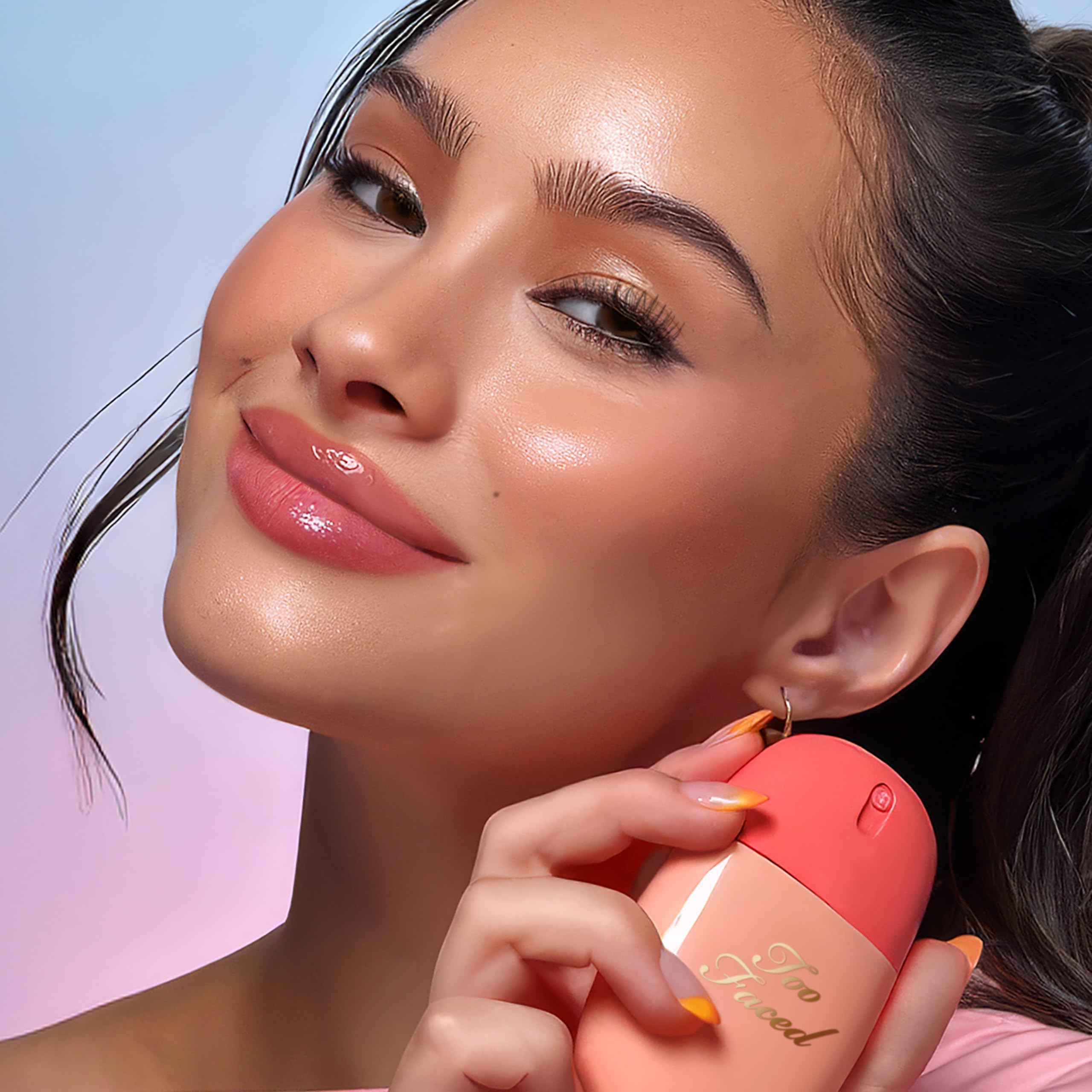 Close-up of Too Faced Peach Mist label highlighting cruelty-free claim and ingredient benefit