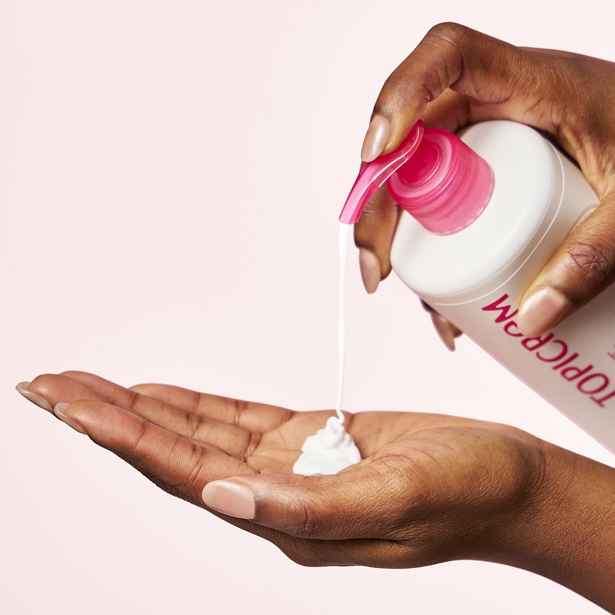 Topicrem spread on adult arm illustrating smooth, non-greasy finish