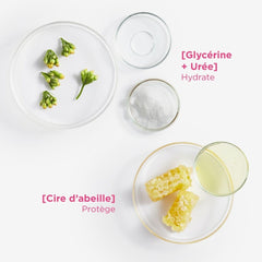 Topicrem close-up pouring body milk showing creamy texture and quick absorption