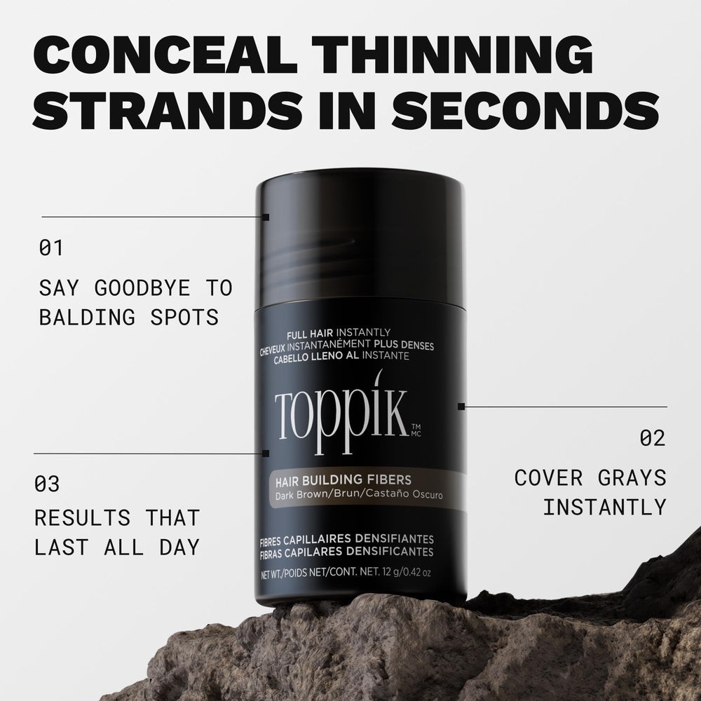 Toppik jar open with gray hair fibers visible and ready to use