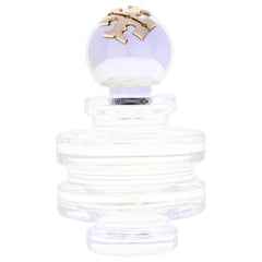 Tory Burch side profile emphasizing glass shape and portability benefit for travel