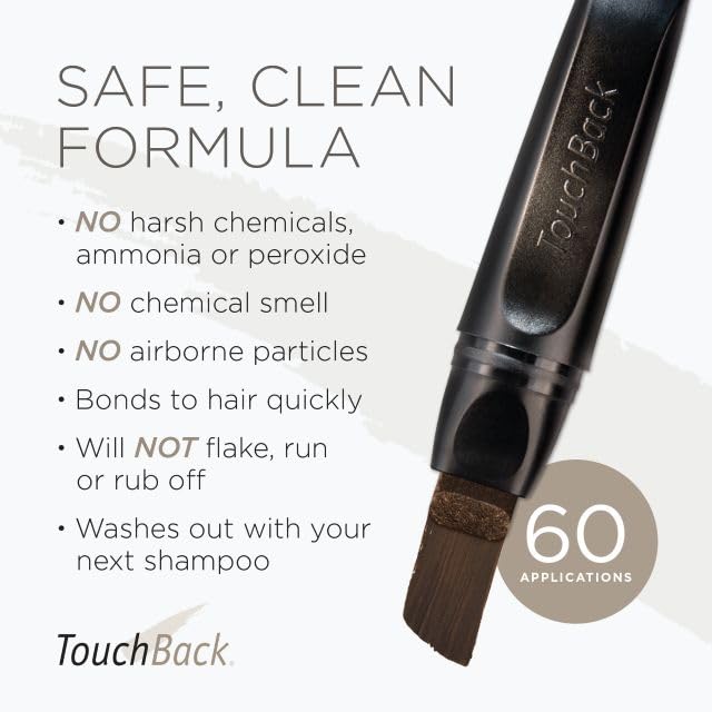 Person holding TouchBack marker demonstrating portable design for touch-ups on the go