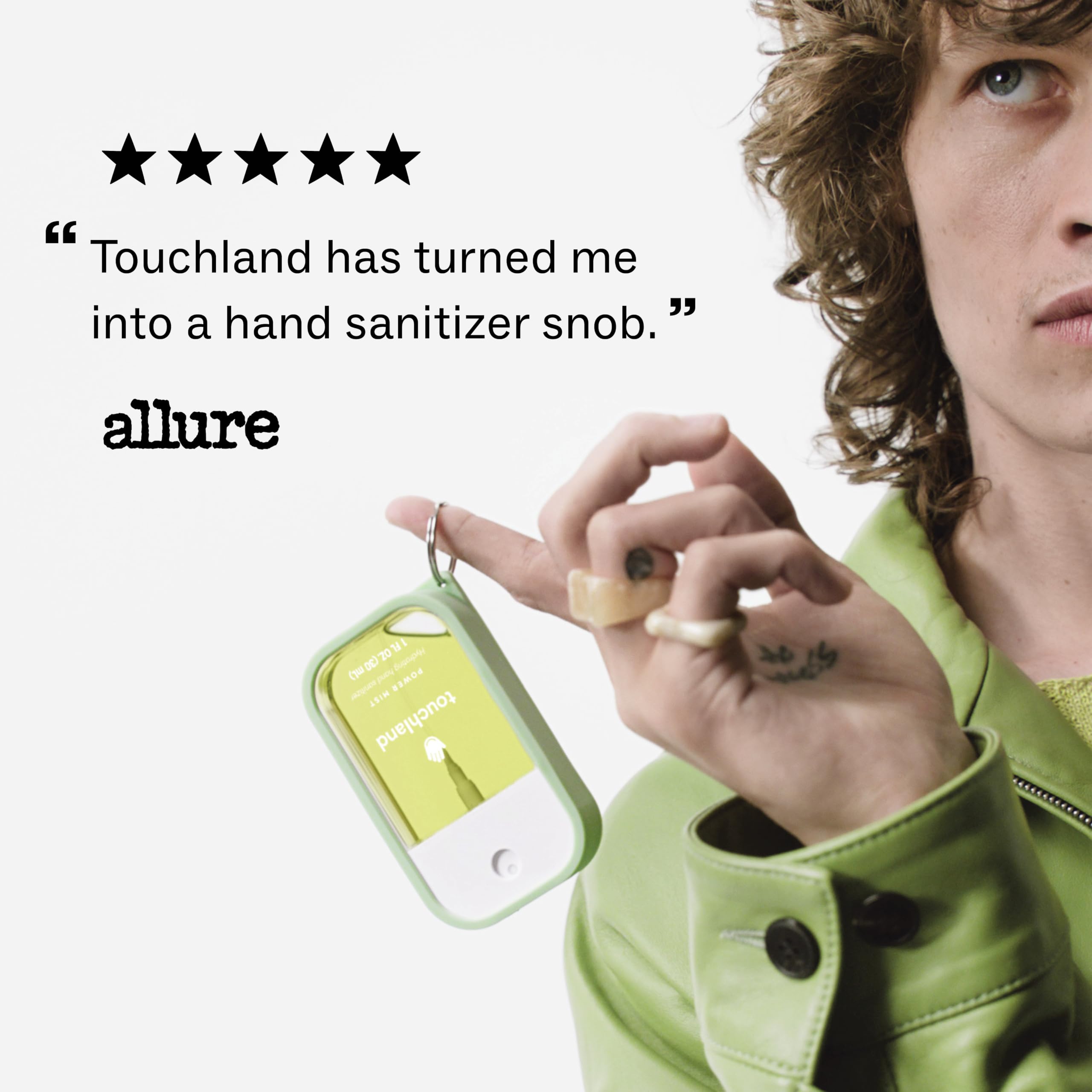 Touchland bottles beside passport illustrating travel-friendly carry size