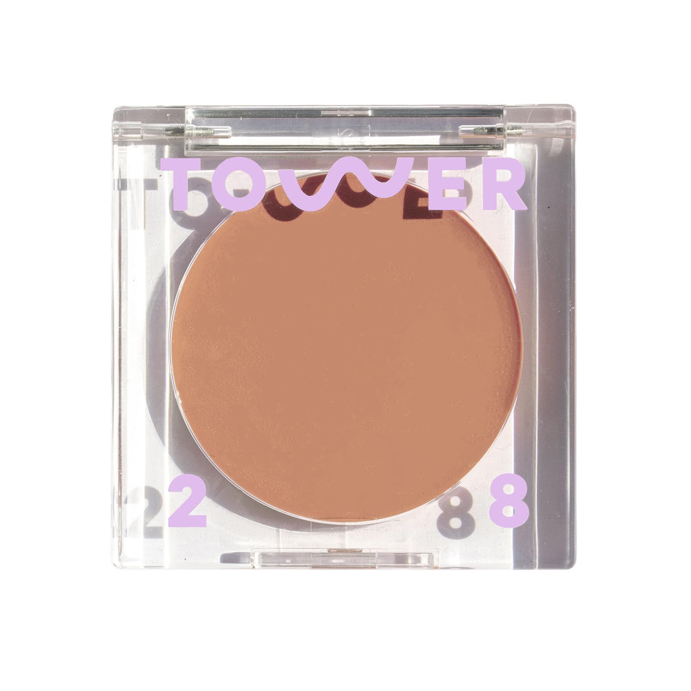 Tower 28 front packaging showing compact bronzer balm, clear neutral shade benefit