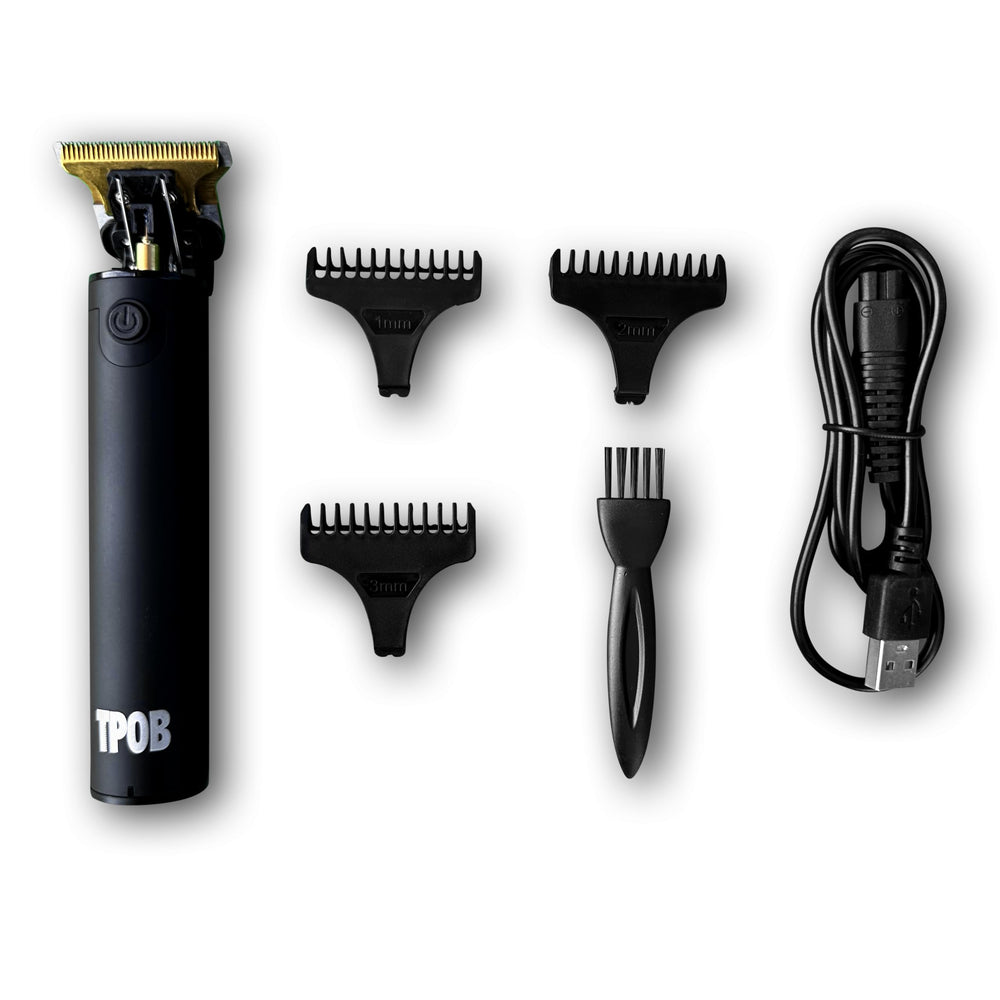 TPOB Ghost trimming a beard to show precise edging and clean line results